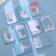 Flachbild von süßen Alpaka-Taschennotizblöcken mit pastellblauen und rosa Einbänden