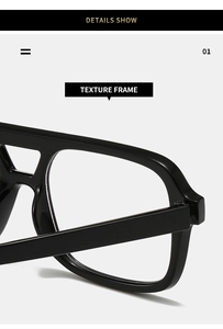 Close-up of black retro double bridge frame with high-gloss polished texture details