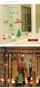 Detail of Merry Christmas static window decals featuring Santa, snowman, and reindeer stickers