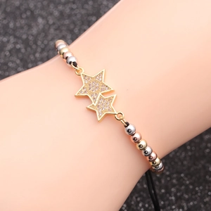 Three-tone beaded bracelet featuring interlocking micro-pave zircon star charms on black cord