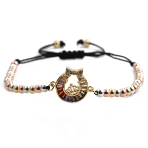 Men's braided crown bracelet with micro-pave zircons and horseshoe charm in multiple metal tones
