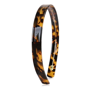 Detail of 1.5cm tortoiseshell acetate headband with smooth texture and glossy finish