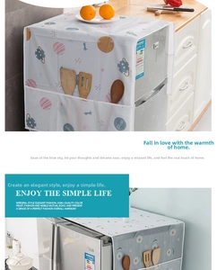 Detail of waterproof refrigerator cover showing side storage pockets with daisy and planet patterns