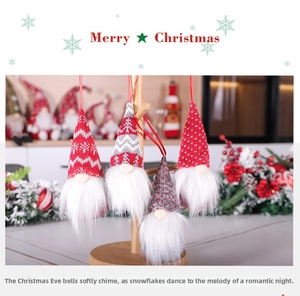 Detail showing four red and grey felt Christmas gnomes hanging on a wooden rack decor