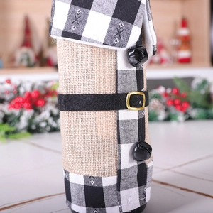 Christmas wine bottle cover with black and white plaid collar and jute fabric detail