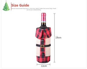 Detail view of 19x12cm Christmas wine bottle cover with red buffalo plaid collar and belt