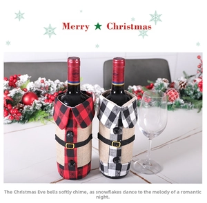 Detail of Christmas wine bottle covers featuring red and black plaid collar and button belt