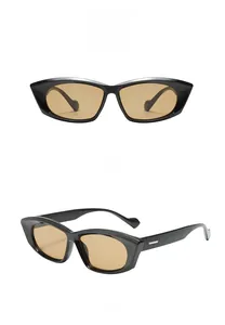 Front and side view of vintage cat-eye sunglasses with black frames and tea lenses