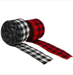 Detail of red-black and white-black plaid ribbons with woven texture for gift wrapping