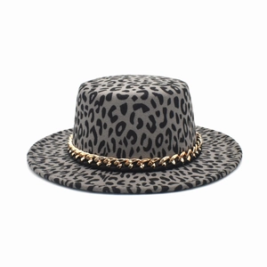 Detail of grey leopard print flat top fedora hat with gold metal chain decoration