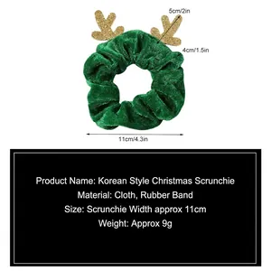 Green Christmas velvet scrunchie with glitter reindeer antlers and sizing info