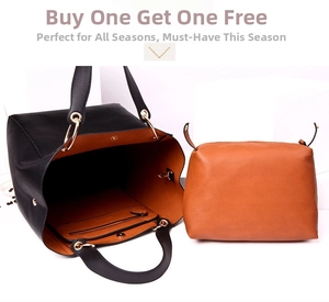 Close-up of black tote and orange pouch set with pebbled leather and gold hardware