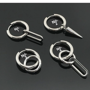 Detailed view of four stainless steel hoop earring styles with cone and oval charms