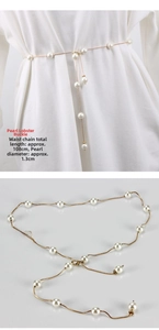 Detail showing elegant gold chain belt with 1.3cm pearls and lobster clasp, 108cm length