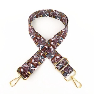 Ethnic bohemian wide woven strap with geometric patterns and golden lobster clasps