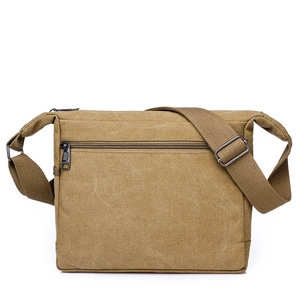 Durable khaki canvas crossbody bag with multiple zip compartments and adjustable strap