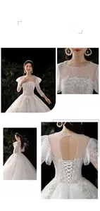 Détails de la robe de mariée en dentelle blanche avec broderie et laçage au dos