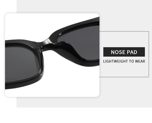 Macro detail of integrated nose pads on black square sunglasses for lightweight comfort