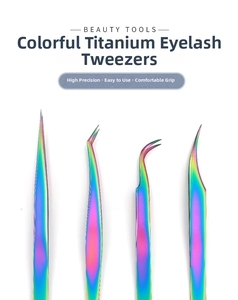 Set of four stainless steel eyelash tweezers with colorful titanium finish for beauty tasks