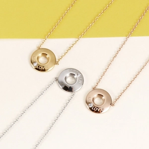 Three My Love letter engraved zircon necklaces in gold, silver, and rose gold plating