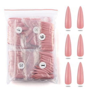 Pink stiletto false nail tips set in numbered poly bags for professional manicures
