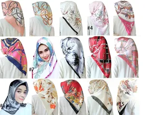 Selection of fifteen stylish satin scarves featuring chain prints and floral patterns