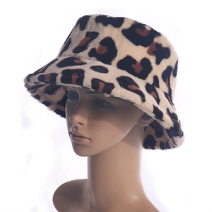 Stylish leopard print faux fur bucket hat for women with soft plush texture and warm design