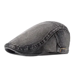 Vintage dark gray washed denim flat cap with adjustable brass buckle on side