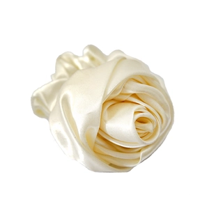 Elegant white satin rose flower hair scrunchie with silk luster on white background