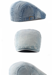 Dettaglio della coppola in denim lavato con fibbia regolabile in bronzo vintage