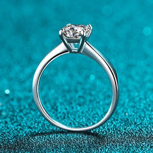 Classic S925 sterling silver moissanite ring with six-prong setting on glitter background