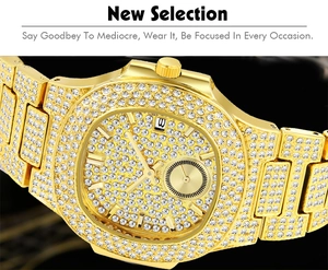 Macro side view of gold-plated iced-out luxury watch with crystal-encrusted octagonal bezel