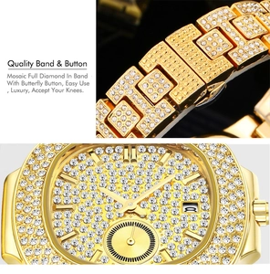 Close-up of luxury gold iced-out watch with full diamond setting and butterfly buckle
