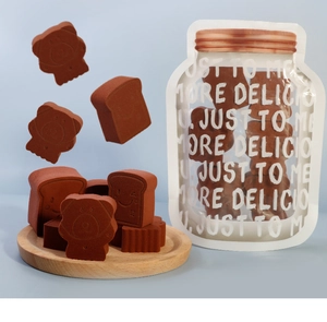 Dynamic floating view of brown toast and bear-shaped sponges on a blue background