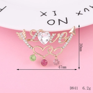 Detailed view of LOVE heart brooch with colorful crystals, size 47mm x 30mm, 6.2g weight