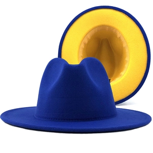 Two-tone wool fedora hat with royal blue exterior and bright yellow interior brim