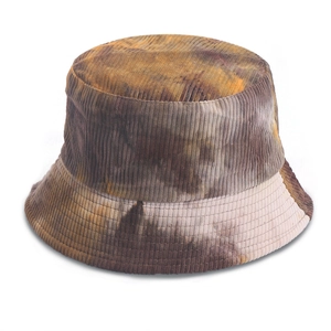 Close-up of tie-dye corduroy bucket hat texture in earthy brown and orange tones