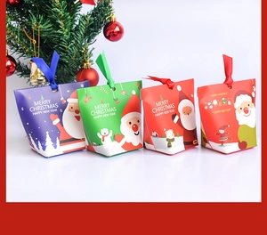 Detail of colorful Christmas gift bags with silk ribbons and Santa Claus illustrations