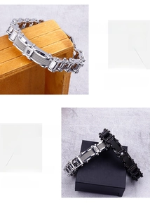 Detailed macro of motorcycle chain bracelets with skull elements in silver and black finish
