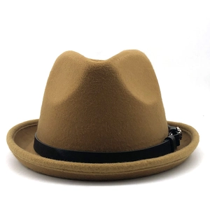 Close-up of camel wool fedora hat featuring a black leather band and silver metal buckle