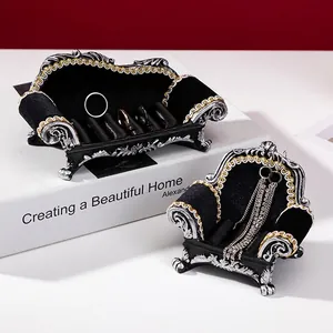 European vintage jewelry display set with black velvet sofa and armchair for rings