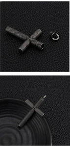 Detail view of knurled grey stainless steel cross pendant with screw-top urn compartment