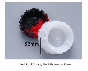 Macro view of a skull-shaped silicone ashtray mold with 52mm thickness and finished product