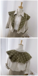 Front and back detail of military green polka dot knitted shawl scarf on a mannequin