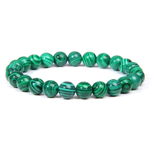 Bracciale di malachite naturale con motivi circolari verdi e finitura lucida levigata