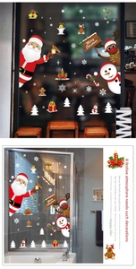 Detail view of festive PVC Christmas wall stickers featuring Santa, snowman and reindeer