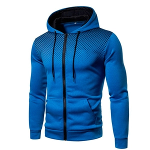 Close-up of royal blue men hoodie featuring black gradient dot pattern and zipper detail