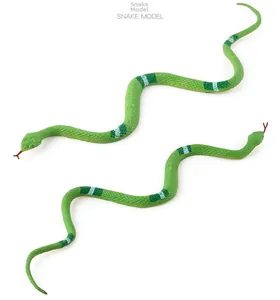 Detailed view of realistic green toy snakes with textures and red forked tongues