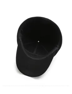 Detail view of the warm interior lining of a black winter hat for elderly men