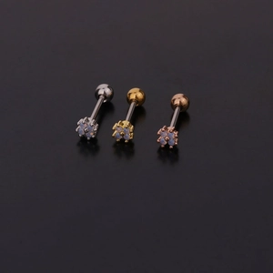 Close-up of opal screw back earrings in silver, gold, and rose gold stainless steel